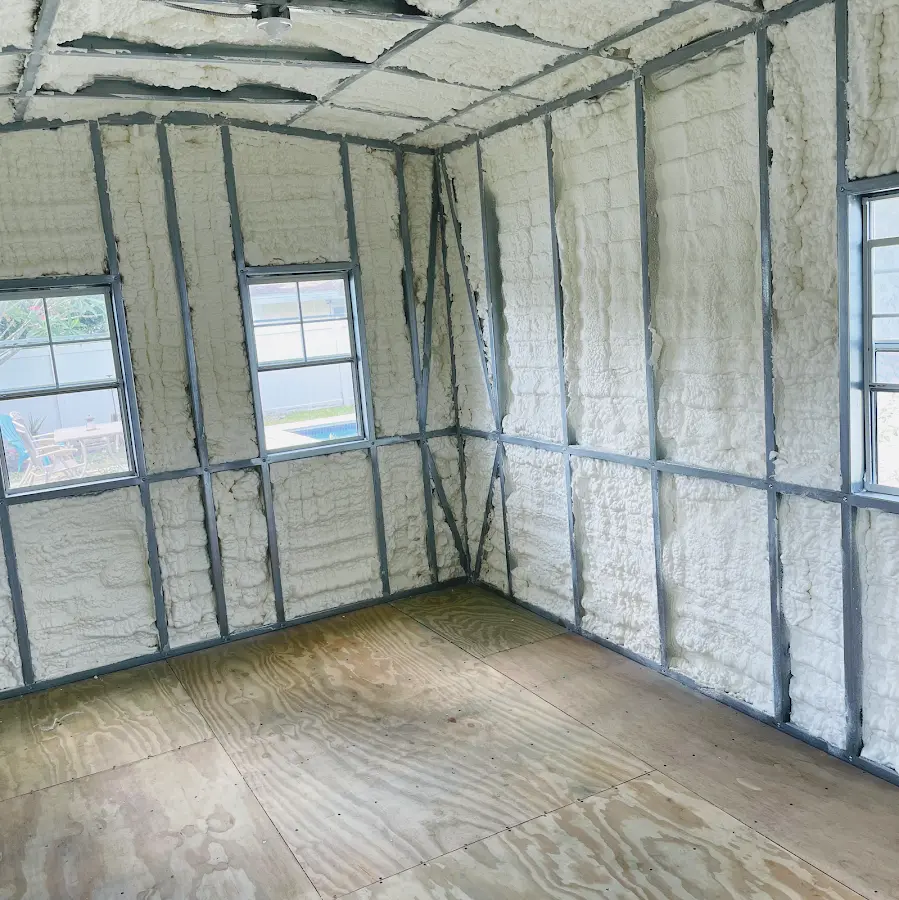 Closed-cell spray foam insulation applied to wall cavities in a residential project in Tallmadge